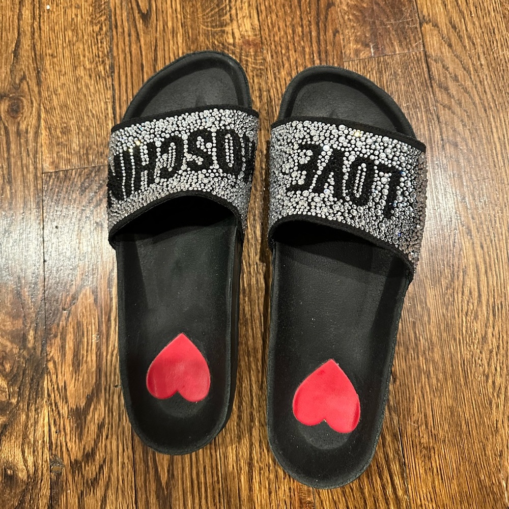 Lightly worn Love Moschino rhinestone logo slides in black, size 39